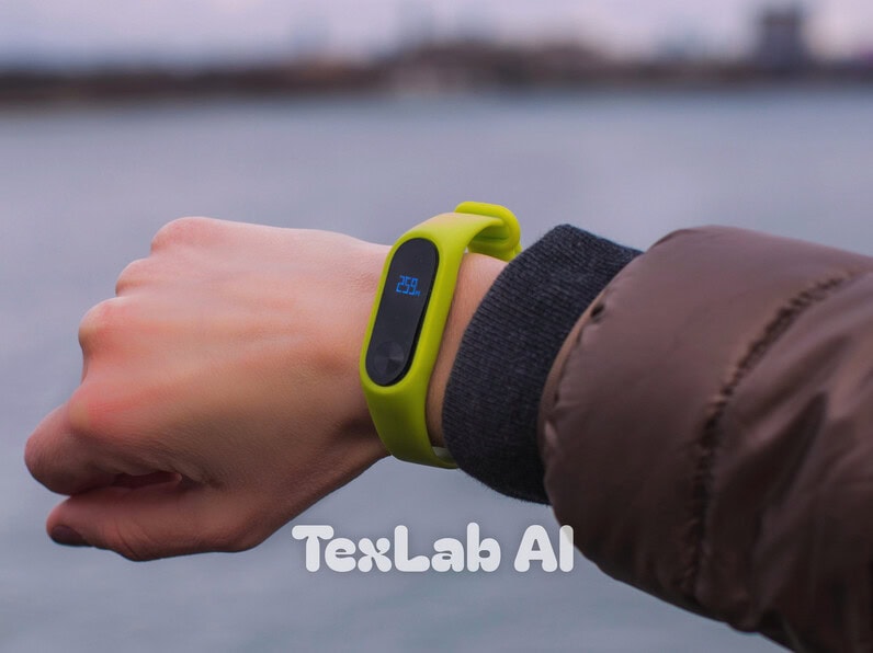 A person wearing a lime green fitness smartband wearable device on their wrist outdoors.